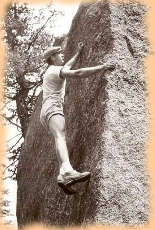 Climber John Gill bouldering