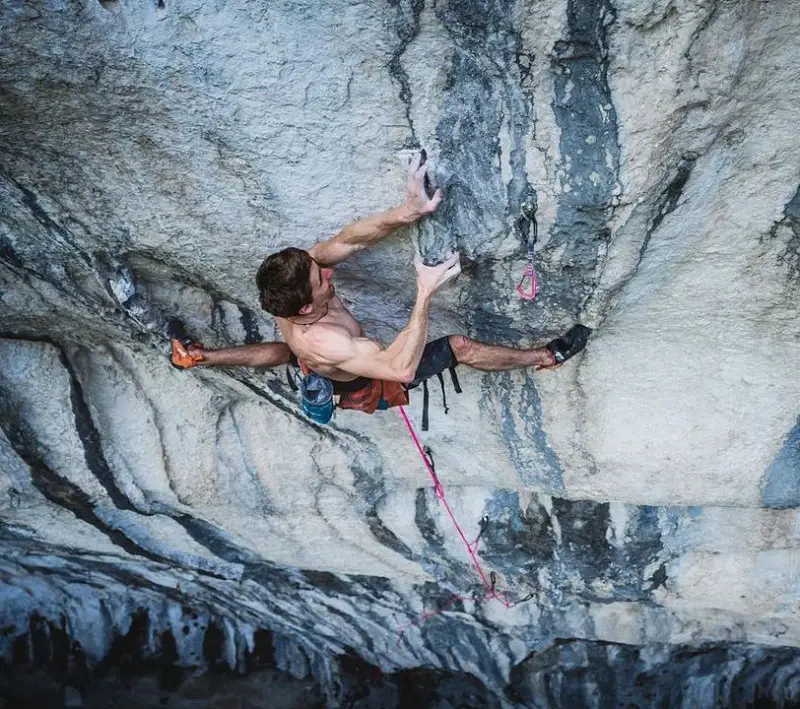 seb bouin on DNA 9c climbing