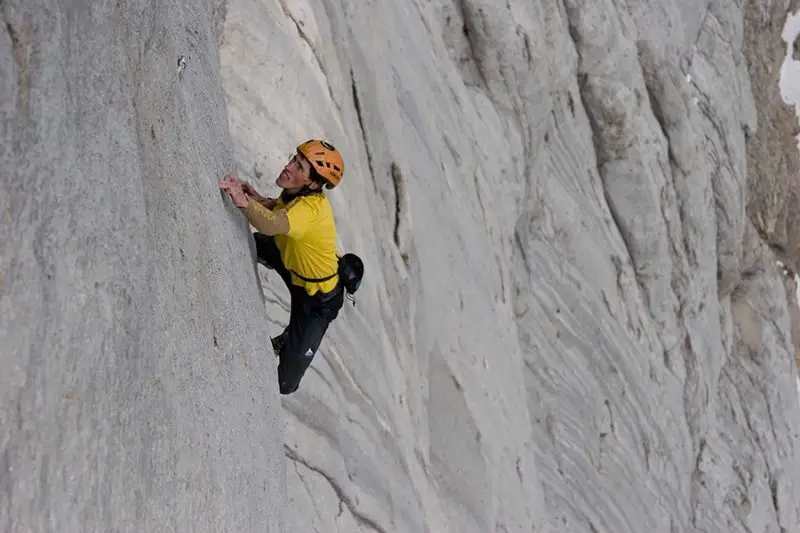 Hansjörg Auer free soloing Fish route in Dolomites