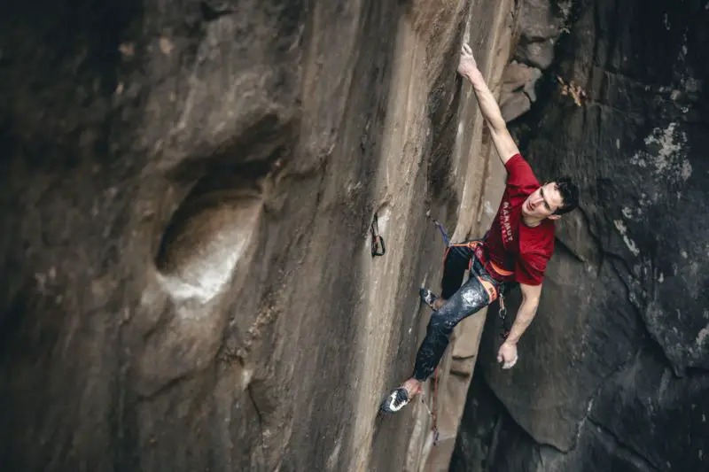 Adam Ondra making the second ascent of Bon Voyage trad route in France
